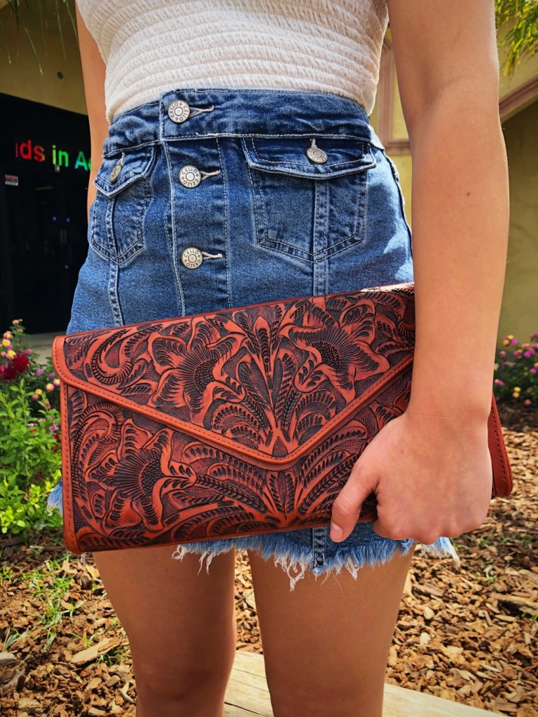 naturally rich tooled clutch