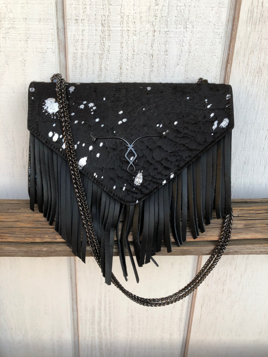 Black And Gold Fringed Beaded Leather Clutch Bag at Rs 7500 | Leather Clutch  Purse in New Delhi | ID: 15946803688